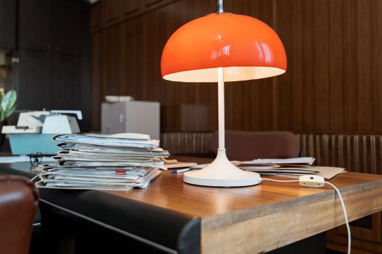 Pile of paperwork on desk - How long does debt review last?