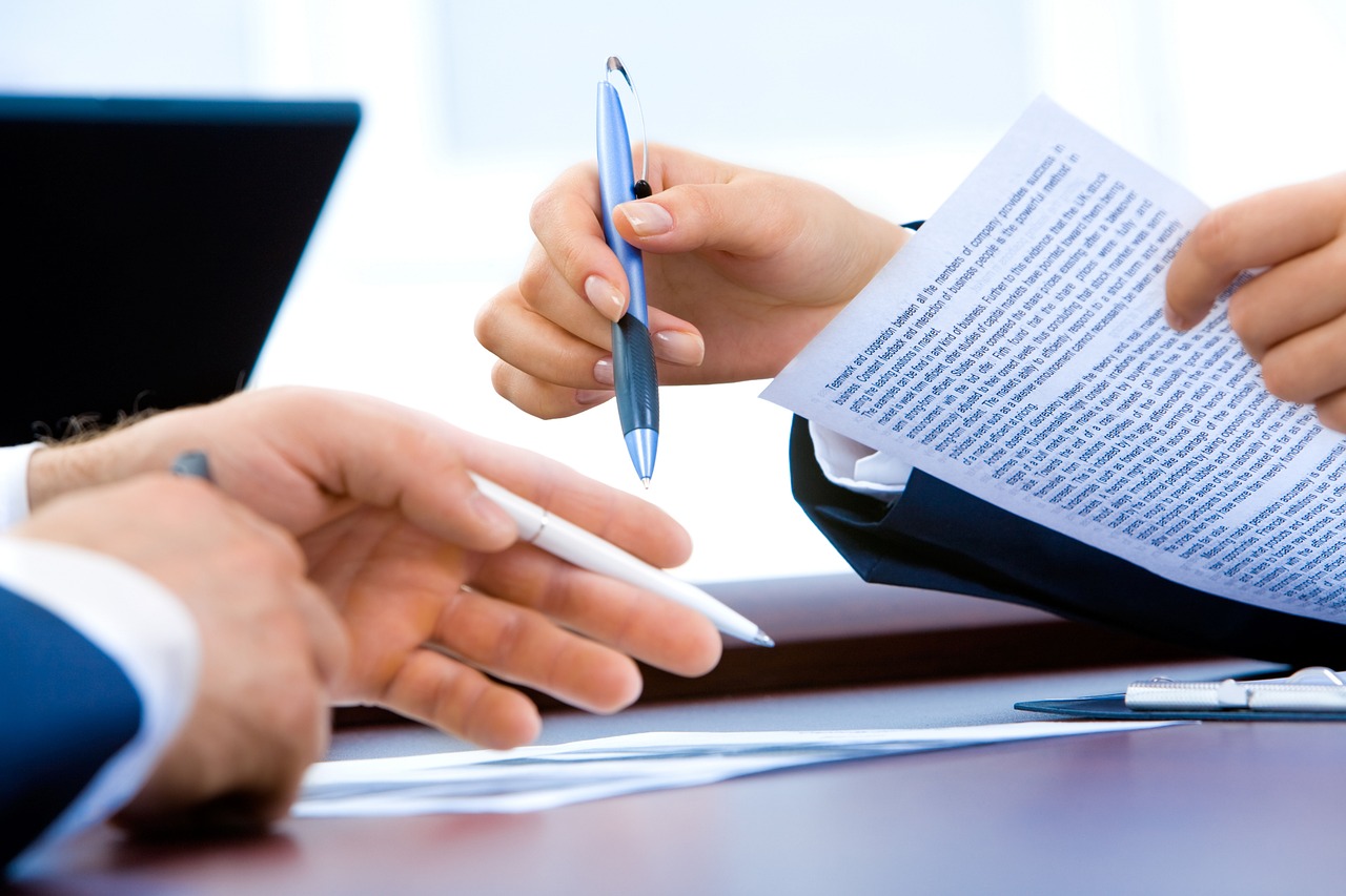 Pile of paperwork on desk - Can you get a loan under debt review?