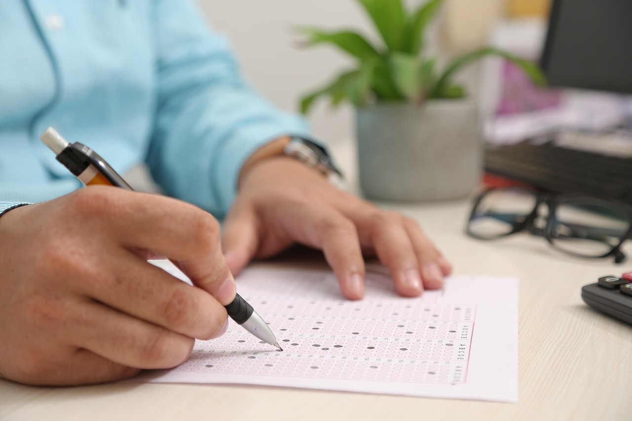 Filling in a form with pen - Credit bureau dispute letter to remove debt review (template)