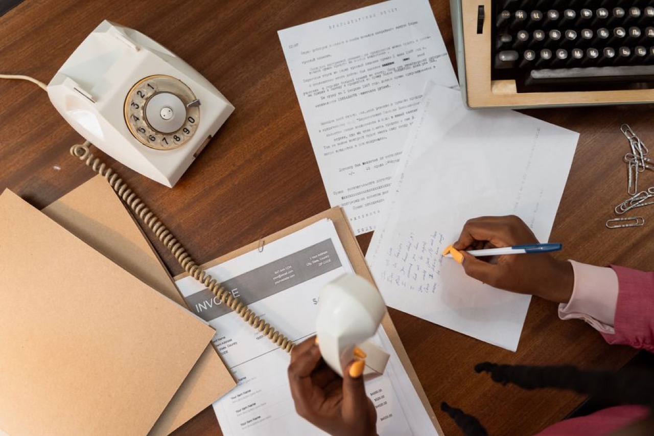 Writing a letter at desk - Complaint letter about a debt counsellor (to the NCR) (template)