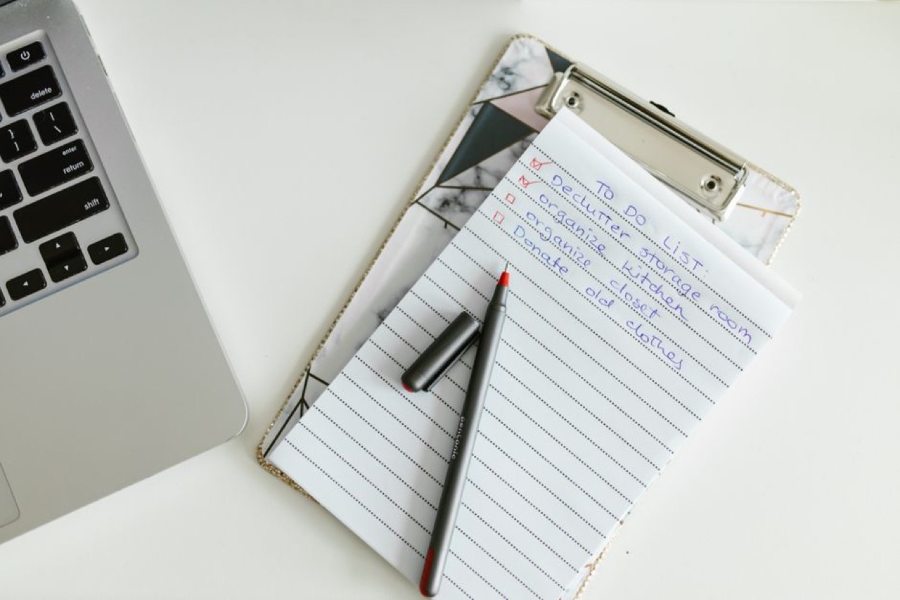 Checklist and clipboard with pen - Debt review application checklist (Form 16)