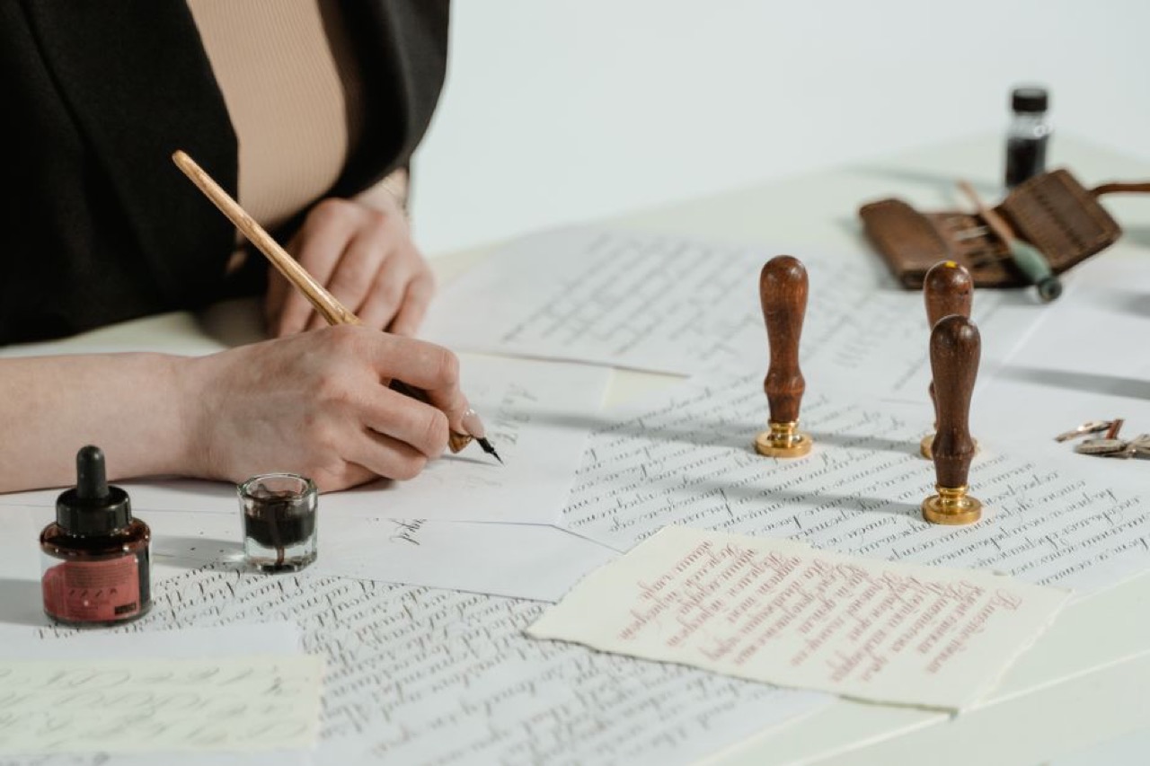 Writing a letter at desk - Settlement offer letter to a creditor (template)
